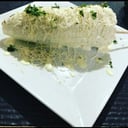 Foto de Choclo a la parrilla bañado en salsa 4 quesos
