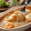 Foto de  Butter shrimp and cheese gratin