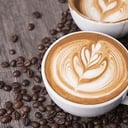 Foto de Café con Leche con 3 Medialunas!