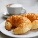 Foto de Coffee with croissants 