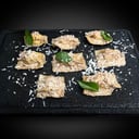 Foto de Raviolli de poro parmesano con salsa de nuez