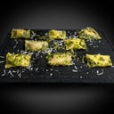 Foto de Raviolli de poro parmesano con salsa de pesto pistache
