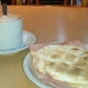 Foto de Café con leche +Arabe Tostado