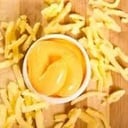 Foto de Porcion de papas fritas + cheddar