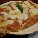 Foto de Trozo de pizza y cafè a elegir 