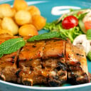 Foto de Rack de costillas de cerdo en salsa de naranja y hierba buena (350g)