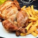 Foto de pollo entero con agregado 