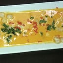 Foto de Tiradito con crema de ají mirasol