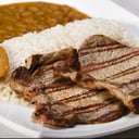 Foto de Arroz con menestra y chuleta de cerdo
