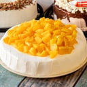Foto de tres leches de mango con betun de queso crema