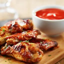 Foto de Patitas de pollo con guarnición