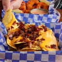 Foto de Nachos con Cheddar y Panceta