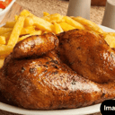 Foto de 1/2 pollo con papas y ensalada