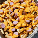 Foto de Salchipapas con Cheddar