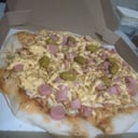 Foto de Muzza, salchichas y papas pay