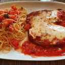 Foto de Milanesa de pollo alla parmigiana