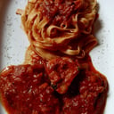 Foto de Ossobuco tradicional en salsa especial preparado al horno 4 horas