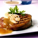 Foto de lomo en salsa de champiñón....$ 9.900