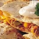 Foto de quesadilla al pastor mucho queso y piña 