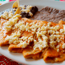 Foto de Cecina con chilaquiles o enchiladas (3pz)