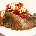 Foto de Arrachera con chilaquiles o enchiladas (3pz)