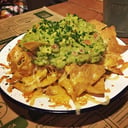 Foto de Nachos con cheddar y palta