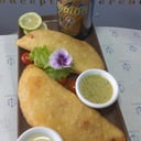 Foto de Empanadas venezolanas + malta