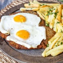 Foto de Milanesa de Ternera 1/2 Caballo C/Guarn.