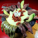Foto de Molcajete de Tasajeada con Papas y Totopos