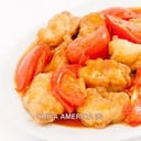 Foto de pescado con tomate con chaufa