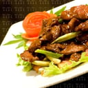 Foto de carne con tomate con chaufa 