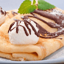 Foto de Celestino  (Panqueques, manjar, porción de helado)