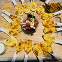 Foto de Tabla de Mariscos Parmesanos