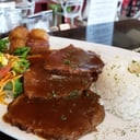 Foto de Asado Negro / Lomo de Res en Salsa con arroz, platano tentación y ensalada