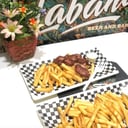 Foto de PAPAS CON TOCINETA BAÑADAS EN QUESO CHEDDAR