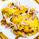 Foto de Papas cheddar, panceta & verdeo