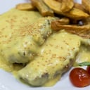 Foto de Bondiola de cerdo, mostaza y miel con batatas fritas