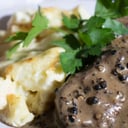 Foto de Lomo pimienta con papas a la crema