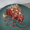 Foto de Torta de chocolate 100% cacao con almendras (Porción)