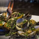 Foto de Tagliolini Neri allo scoglio