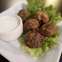 Foto de Croquetas de risotto en tinta de calamar