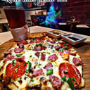 Foto de Pizza personal sencilla  queso y pepperoni.