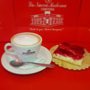 Foto de Café con leche + cuadrado dulce