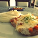 Foto de Pata de muslo a la pizza / Sólo
