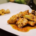 Foto de Pollo Salseado con Guarnición 