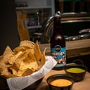 Foto de Porcion de Nachos + Queso