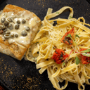 Foto de CORVINA MARINADA CON FETTUCCINI ALL’ OLIO