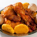 Foto de medio pollo asado al carbón