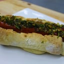 Foto de CHORIPERRO EN PAN DE MOLE DE CHOCOLATE Y CHIMICHURRI
