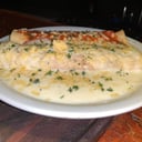 Foto de Canelones de calabaza, muzzarella y verdeo